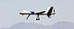 The new U.S. Customs and Border Protection unmanned aircraft the MQ-9 Predator is shown in flight at Fort Huachuca Army base, in Sierra Vista, Ariz. (AP Photo/John Miller)
