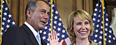 House Speaker John Boehner of Ohio reenacts the swearing in of Rep. Gabrielle Giffords, D-Ariz., Wednesday, Jan. 5, 2011, on Capitol Hill in Washington. (AP Photo/Susan Walsh)