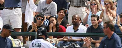 Fans cheer as Ichiro Suzuki #51 of the Seattle Mariners goes back to the dugout during the game against the Detroit Tigers on July 15, 2007 at Safeco Field in Seattle, Washington. The Tigers won 11-7. (Photo by Otto Greule Jr/Getty Images)