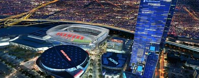 In an image provided by AEG, a proposed NFL football stadium, to be named Farmers Field, is depicted next to Staples Center in Los Angeles. (AP Photo/AEG)