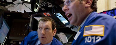 Traders work on the floor of the New York Stock Exchange on Monday, Aug. 8, 2011 in New York. (AP Photo/Jin Lee)