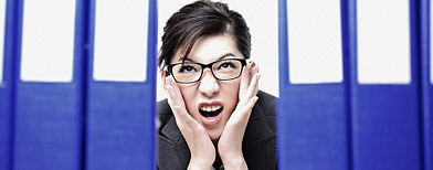 Angry woman at work (Thinkstock)