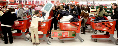 Customers wait in line at a Target store (AP)