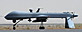 A US Predator unmanned drone armed with a missile stands on the tarmac of Kandahar military airport in Afghanistan, Sunday June 13, 2010. (AP Photo//Massoud Hossaini, Pool)