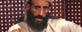 In this image taken from video and released by SITE Intelligence Group on Monday, Nov. 8, 2010, Anwar al-Awlaki speaks in a video message posted on radical websites. (AP Photo/SITE Intelligence Group)