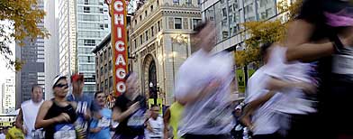 Runners participate in the Chicago Marathon in Chicago, Sunday, Oct. 9, 2011. (AP Photo/Nam Y. Huh)