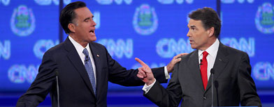 Mitt Romney (left) and Rick Perry during the CNN debate in Las Vegas (Steve Marcus/Reuters)