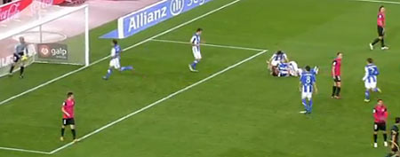 Carlos Vela is smothered by teammates after his stunning goal (Y! Sports screengrab)