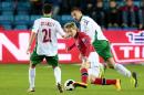 Norway's youngest player, Martin Odegaard, centre, avoids Bulgaria's Svetoslav Dyakov, left, during the Euro 2016 Group H qualifying soccer match between Norway and Bulgaria at Ullevaal Stadium in Oslo Monday, Oct. 13, 2014. (AP Photo/NTB Scanpix, Hakon Mosvold Larsen) NORWAY OUT