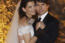 FILE - In this Nov. 18, 2006 file photo released by Rogers and Cowan, actor Tom Cruise and actress Katie Holmes pose in their wedding attire at the 15th-century Odescalchi Castle overlooking Lake Bracciano outside of Rome. Cruise and Homes are calling it quits after five years of marriage. Holmes' attorney Jonathan Wolfe said Friday June 29, 2012 that the couple is divorcing, but called it a private matter for the family. (AP Photo/Robert Evans, File)