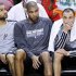 Spurs' Parker, Duncan, and Ginobili sit on the bench during their loss to the Heat in Game 2 of their NBA Finals basketball playoff in Miami