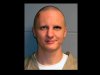 FILE - This photo released Tuesday, Feb. 22, 2011, by the U.S. Marshal's Service shows Jared Lee Loughner, the suspect in the Tucson shooting rampage that killed six people and left several others wounded, including then-U.S. Rep. Gabrielle Giffords. A person familiar with the Jared Lee Loughner case says a court-appointed psychiatrist will testify Tuesday, Aug. 7, 2012 that Loughner is competent to enter a plea in the murders and attempted murders including the wounding of former U.S. Rep. Gabrielle Giffords.  (AP Photo/U.S. Marshal's Office, File)