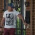 Carl Pistorius, brother of Olympian athlete, Oscar Pistorius, arrives at home, Sunday Feb. 24, 2013,  where his brother has been staying in Pretoria, South Africa, since being granted bail Friday for the Valentine's Day shooting death of his girlfriend, Reeva Steenkamp. Reports emerged Sunday that Carl Pistorius is facing charges of culpable homicide for the death of a woman biker who was knocked down in 2010. (AP Photo)