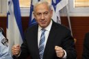 Israel's Prime Minister Benjamin Netanyahu gestures during his visit to the police headquarters in Jerusalem