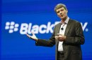 In this May 14, 2013 photo, Thorsten Heins, president and CEO at BlackBerry, speaks at a conference in Orlando, Fla. BlackBerry on Friday, Sept. 20, 2013 said that it will lay off 4,500 employees, or 40 percent of its global workforce, as it reports a nearly $1 billion second-quarter loss a week earlier than the results were expected. (AP Photo/John Raoux, File)