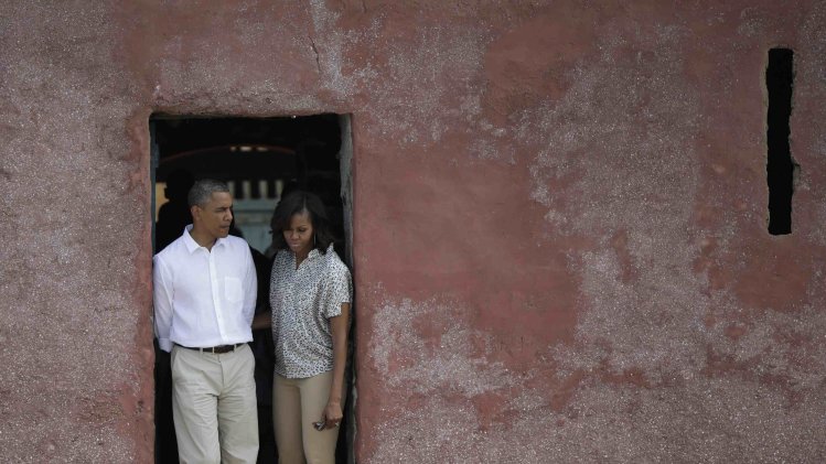 US President Obama and Michelle Obama view area where slaves departed from Goree Island in Dakar