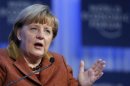 Merkel urges EU to stick to structural reforms