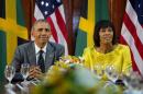 US President Barack Obama and Jamaican Prime Minister Portia Simpson-Miller during their bilateral meeting at the Jamaica House, Thursday, April 9, 2015, in Kingston, Jamaica. The president said Thursday that he soon decide whether to remove Cuba from the U.S. list of state sponsors of terrorism now that the State Department has finished a review on the question as part of the move to reopen diplomatic relations with the island nation. (AP Photo/Pablo Martinez Monsivais)