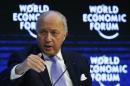 French Foreign Minister Fabius attends the session "The New Climate and Development Imperative" during the Annual Meeting of the WEF in Davos