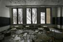 FILE- This file photo from Jan. 6, 2015, shows a vacant classroom at Southwestern High School in Detroit. Michigan lawmakers trying to glue together a plan to fix Detroit Public Schools using taxpayer money are staring down more than a decade of failure with what was once among the largest public education systems in the nation. (AP Photo/Carlos Osorio, File)