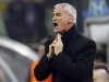 Inter Milan's coach Claudio Ranieri reacts during their Champions League round of 16 second leg soccer match against Olympique Marseille at Giuseppe Meazza stadium in Milan