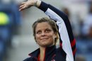 Kim Clijsters of Belgium waves to the gallery after her loss to Laura Robson of Britain in their women's singles match at the U.S. Open tennis tournament in New York