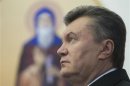 Ukrainian President Yanukovich attends a ceremony to mark the opening of a church on a military base in Kiev