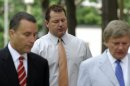 Former Major League baseball pitcher Roger Clemens, center, and his legal team, arrive at federal court in Washington, Wednesday, May 30, 2012. Attorney Rusty Hardin is at right. (AP Photo/Susan Walsh)