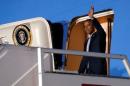 Obama arrives aboard Air Force One ahead of a NATO Summit, at Chopin Airport in Warsaw, Poland
