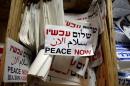 Stickers bearing the logo of Peace Now, an Israeli NGO, are seen at their offices in Tel Aviv, Israel