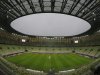 In this photo taken with a fisheye lens, a general view of the Gdansk stadium during a training session by the Greek national soccer team prior to the Euro 2012 soccer quarterfinal match between Germany and Greece in Gdansk, Poland, Thursday, June 21, 2012. (AP Photo/Frank Augstein)