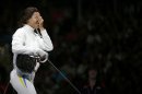 Ukraine's Shemyakina celebrates defeating China's Sun during their women's epee individual semifinal fencing competition at the ExCel venue at the London 2012 Olympic Games