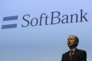 Softbank Corp President Masayoshi Son speaks during a news conference in Tokyo July 30, 2013.