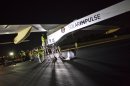 Crew members of Solar Impulse project check the HB-SIA experimental aircraft before taking off at Barajas airport in Madrid, Spain, Tuesday, June 5, 2012. The solar-powered airplane arrived in Madrid on May 25, 2012 from Payerne, Switzerland, and now goes on to Rabat, Morocco on its first transcontinental trip. The mission is described as the final dress rehearsal for a round-the-world flight with a new and improved aircraft in 2014.(AP Photo/Alberto Di Lolli)