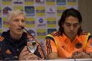 Colombia's national soccer team coach Jose Pekerman, left, announces the roster of players for the Brazil 2014 World Cup, with Colombian star Radamel Falcao Garcia sitting next to him, in Buenos Aires, Argentina, Monday, June 2, 2014. Falcao will not play in this World Cup as Pekerman did not include him in the final team roster. (AP Photo/Eduardo Di Baia))