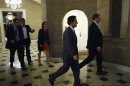 U.S. House Majority Leader Cantor walks into the offices of Speaker Boehner during a rare late-night Saturday session at the U.S. Capitol in Washington