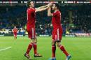 Andy King (L) of Wales celebrates scoring with Hal Robson Kanu during their international friendly football match against Finland at Cardiff City Stadium in Cardiff, south Wales on November 16, 2013