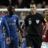 In this Sunday, Oct. 28, 2012 photo, Chelsea's Ramires, center left, remonstrates with referee Mark Clattenburg, center right, during their English Premier League soccer match against Manchester United at Stamford Bridge, London. Chelsea accused referee Mark Clattenburg of using "inappropriate language" at two players during Sunday's Premier League match against Manchester United, and lodged an official complaint with the Football Association. Clattenburg sent off two Chelsea players in the 3-2 loss to United at Stamford Bridge and allowed a contentious late winning goal to striker Javier Hernandez, who appeared to be offside when he scored. (AP Photo/Sang Tan)