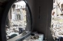 An old damaged house is pictured in Homs