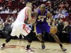 Los Angeles Lakers' Kobe Bryant (24) pushes against Houston Rockets' Jeremy Lin, left, in the first half of an NBA basketball game, Tuesday, Dec. 4, 2012, in Houston. (AP Photo/Pat Sullivan)