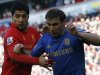 Chelsea's Ivanovic challenges Liverpool's Suarez during their English Premier League soccer match in Liverpool