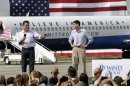 Republican presidential candidate Mitt Romney, accompanied by his vice presidential running mate Rep. Paul Ryan, R-Wis., speaks during a campaign event at Lakeland Linder Regional Airport in Lakeland, Fla., Friday, Aug. 31, 2012. (AP Photo/Mary Altaffer)