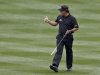 Phil Mickelson gives a thumbs-up to the cheering crowd as he walks up the 18th fairway during the final round of the Waste Management Phoenix Open golf tournament on Sunday, Feb. 3, 2013, in Scottsdale, Ariz. (AP Photo/Ross D. Franklin)
