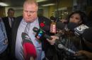 Toronto Mayor Rob Ford reacts to a video released of him by local media at City Hall in Toronto, November 7, 2013. REUTERS/Mark Blinch