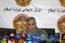 Iraq's Defence Minister Khaled al-Obeidi speaks during a news conference in Baghdad