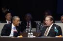 U.S. President Obama listens to Pakistan's PM Sharif during the opening session of the Nuclear Security Summit in The Hague