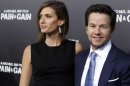Actor Mark Wahlberg and his wife Rhea Durham arrive at the premiere of his new film "Pain & Gain" in Hollywood