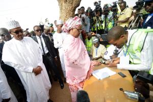 Aisha Buhari (C) registers to vote on March 28, 2015 …