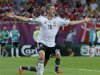 Germany's Bender celebrates after scoring a goal against Denmark during their Euro 2012 Group B soccer match at the new stadium in Lviv