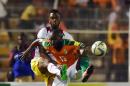 Ivory Coast's Sio Giovanni (R) vies with Mali's Samba Sow during the FIFA World Cup 2018 football qualification match between Ivory Coast and Mali at the stade de la Paix in Bouake on October 8, 2016